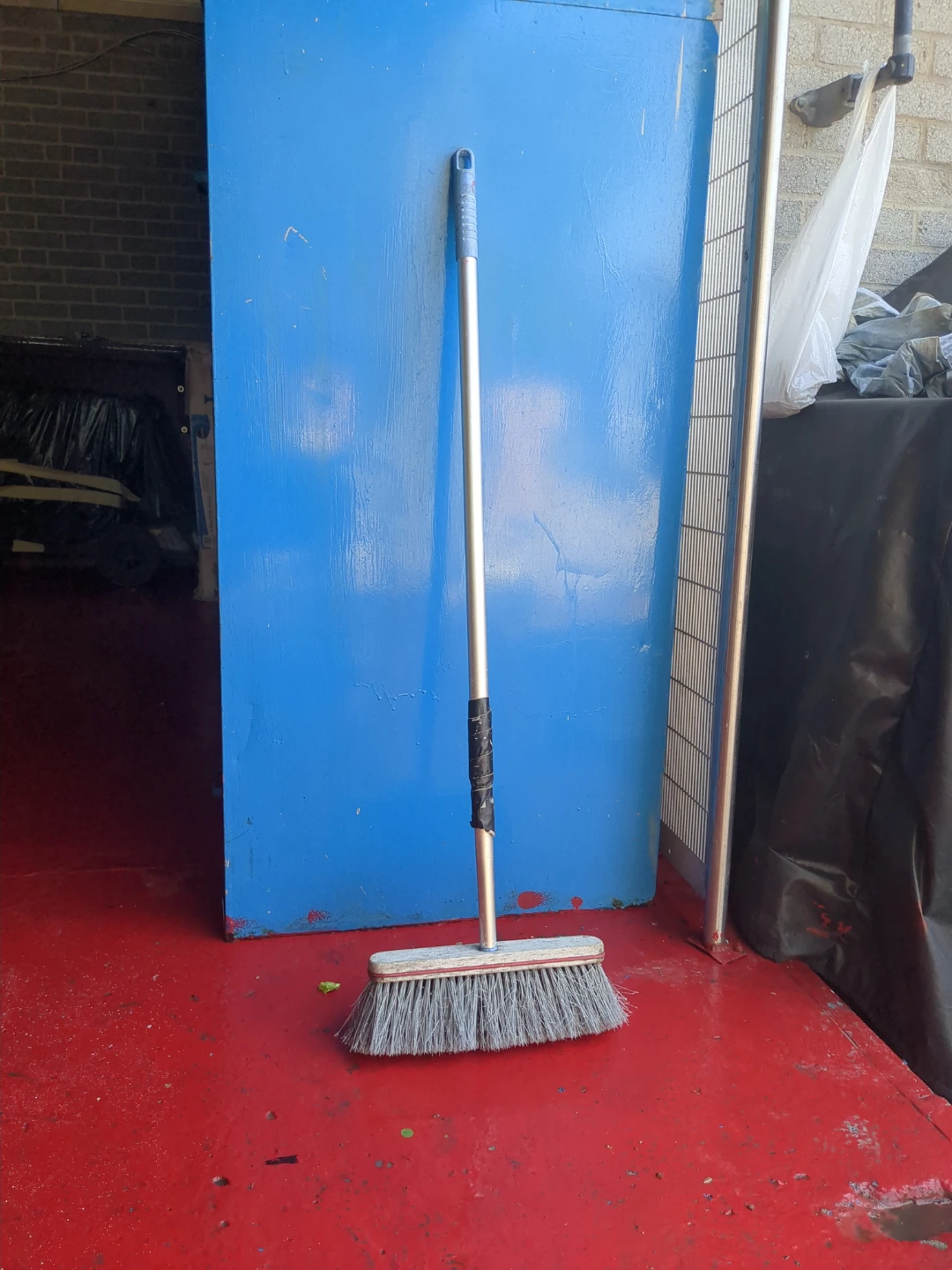 Broom with metal handle