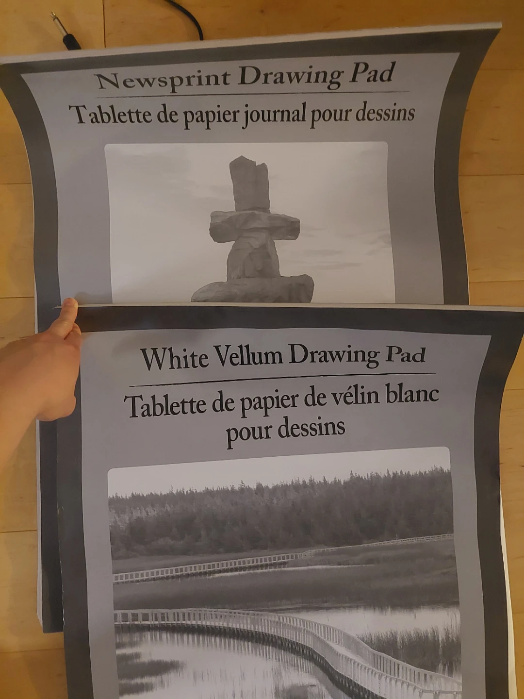 Two drawing pads (one vellum, one newsprint)