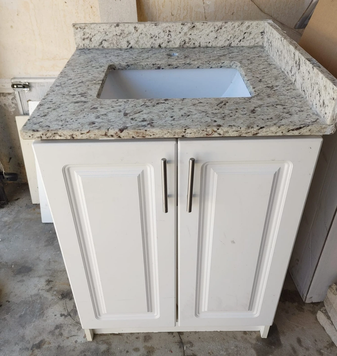 White Vanity Cabinet with Granite Countertop and Sink