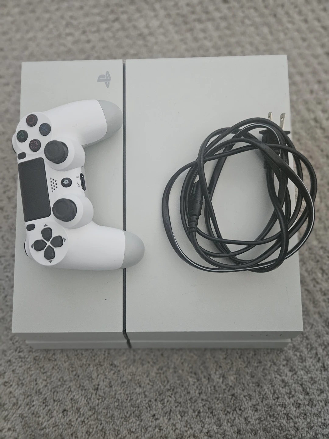 White PlayStation 4 Console with Controller and Cables