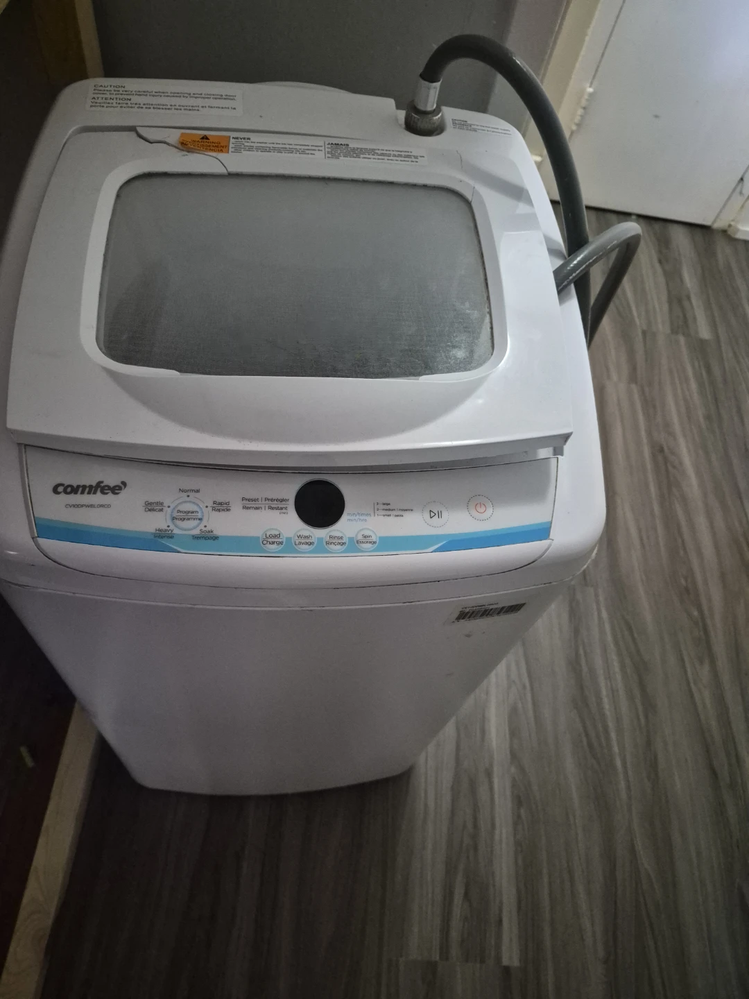 Comfee Top Load Washing Machine with water connection.