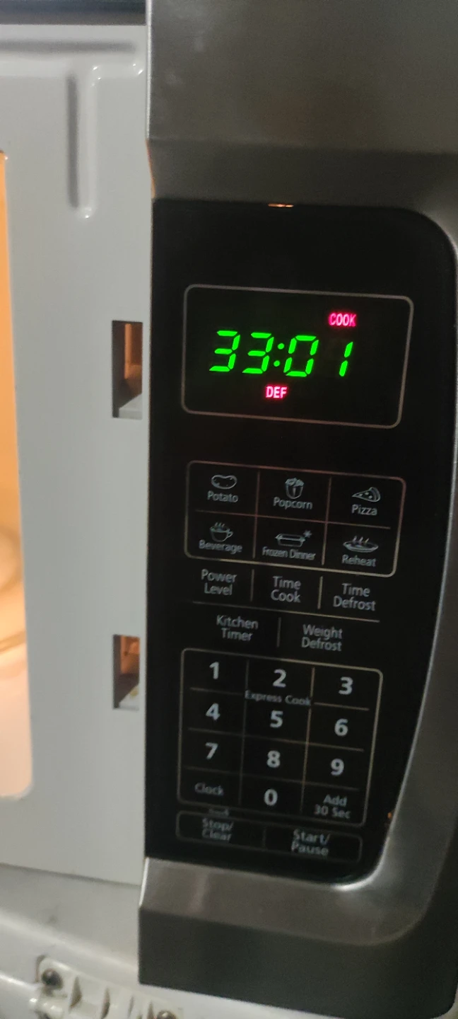 RCA Stainless Steel Microwave - photo 4
