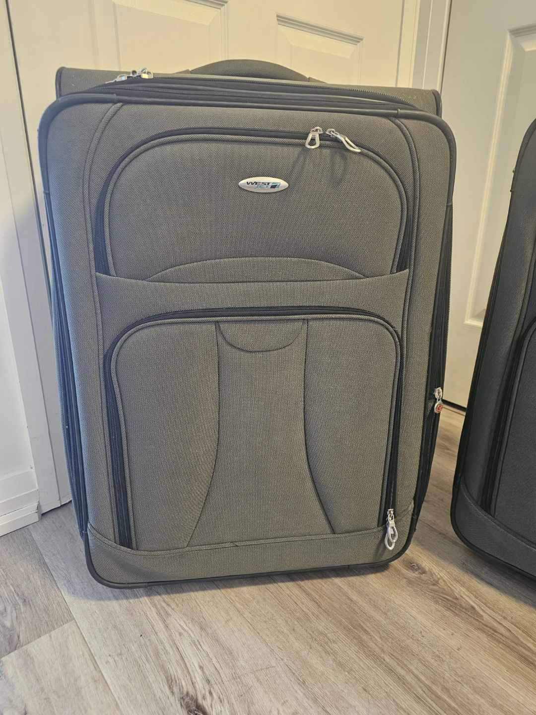 2 WestJet, Olive green color,  Rolling Suitcase Set