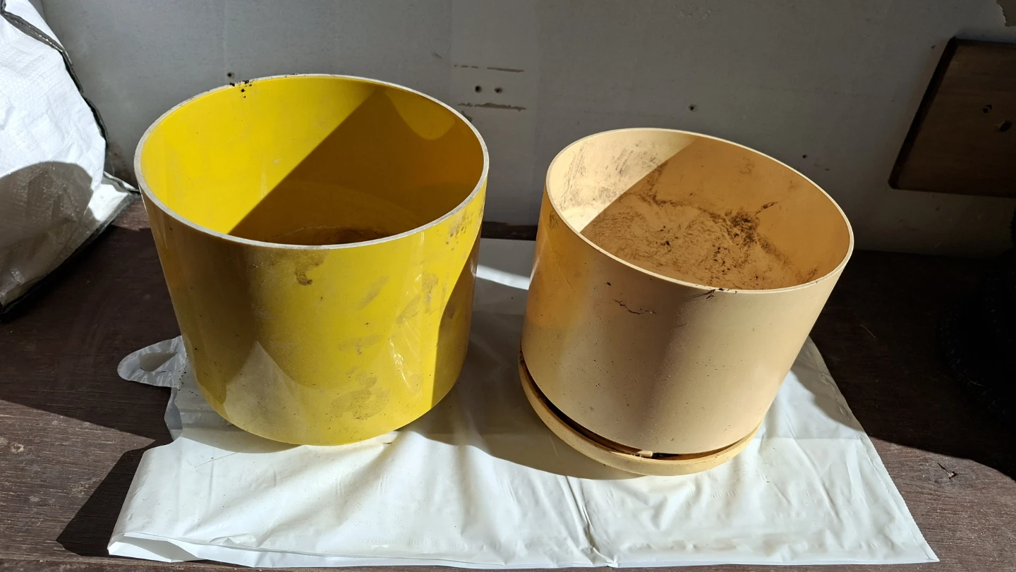 Two Yellow & Beige Plastic Plant Pots