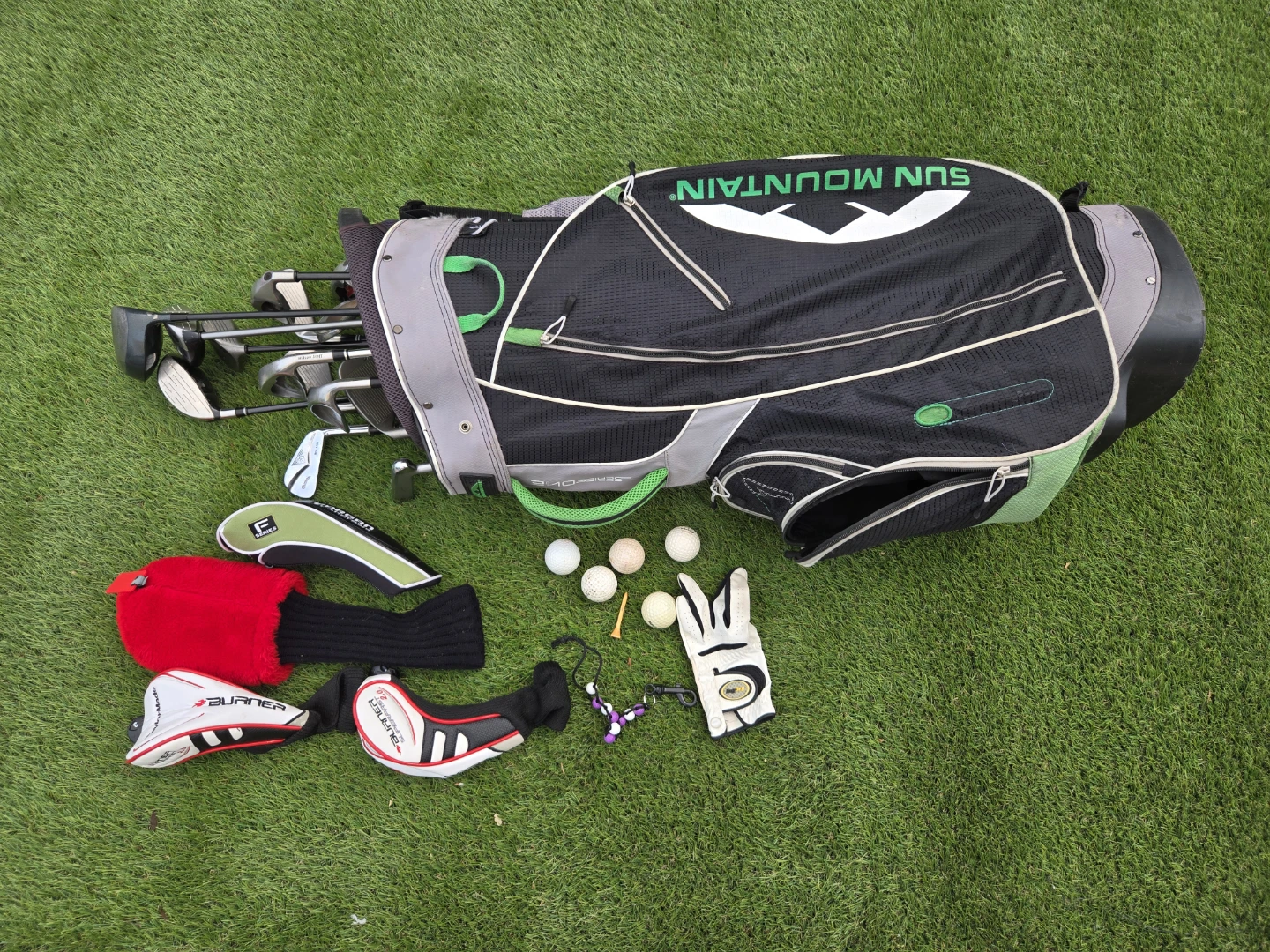 14 Set of Golf Clubs with Sun Mountain Bag  $120