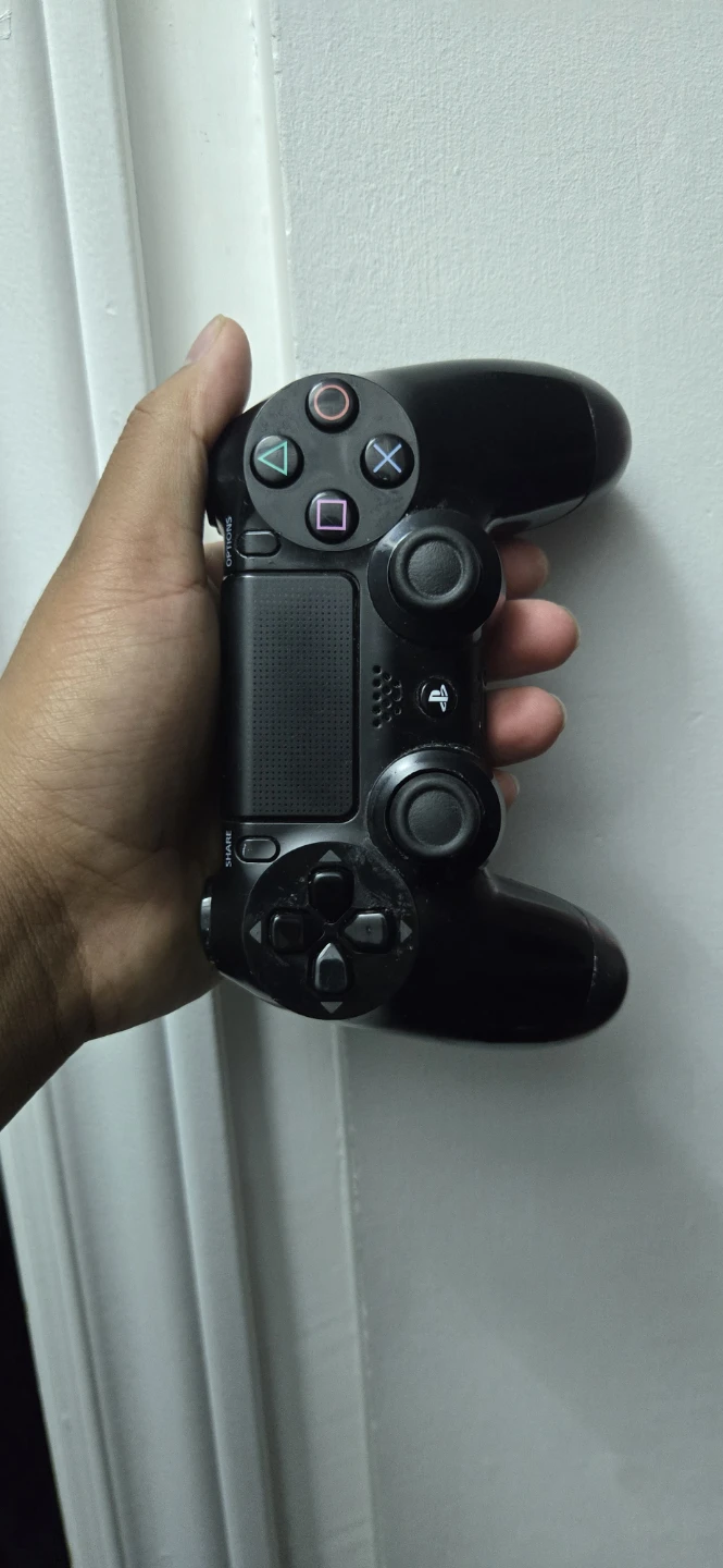 Black Sony PlayStation 4 DualShock 4 Controller