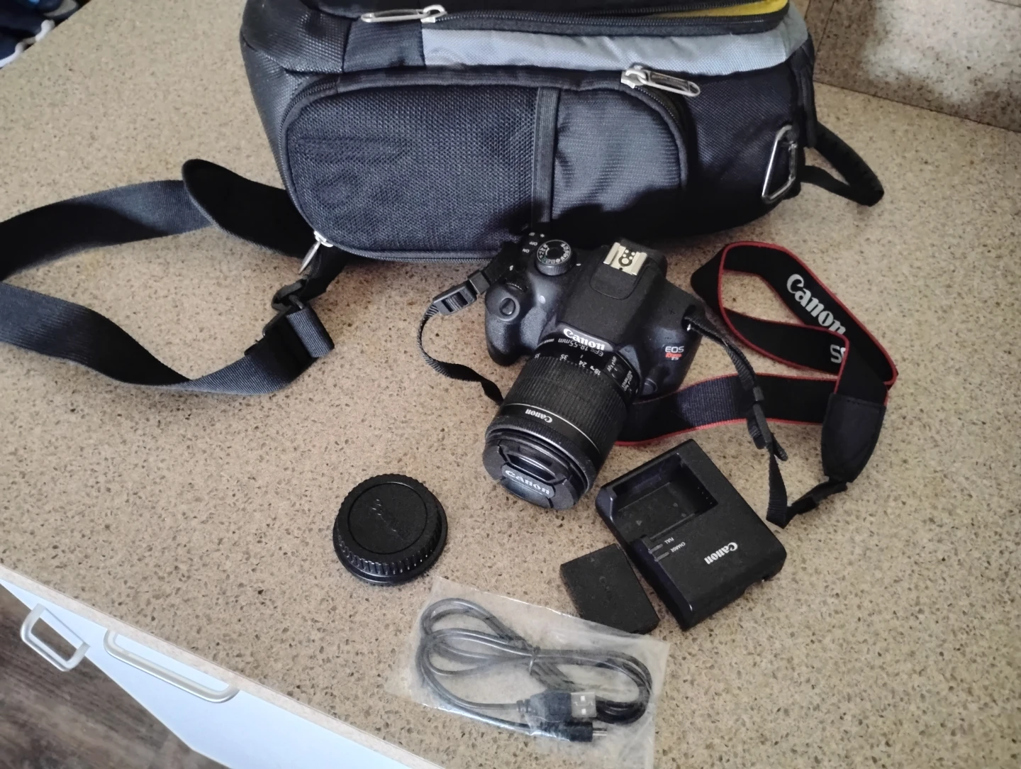 Canon EOS Rebel T3 DSLR Camera with 18-55mm Lens and Bag