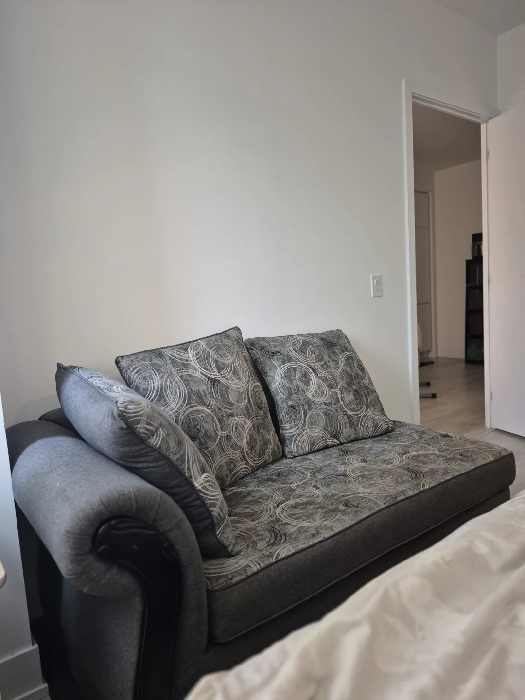 Grey Chaise Lounge with Decorative Pillows