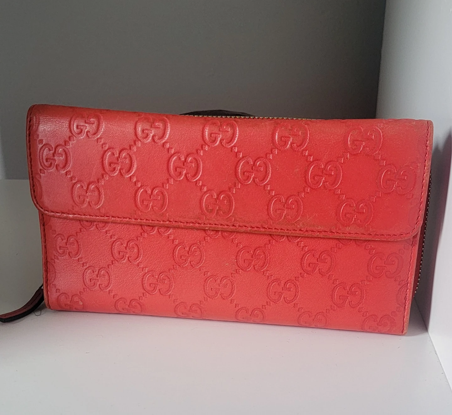 Authenic Gucci Embossed Leather Wallet