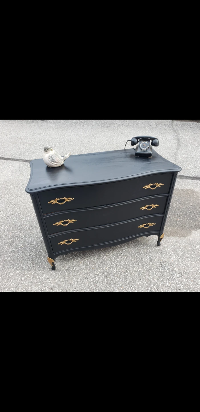Black Three-Drawer Dresser with Gold Accents