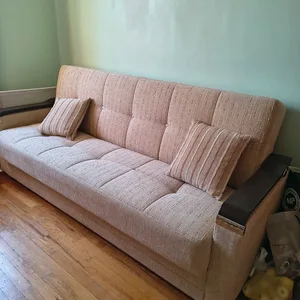 Beige Sofa-bed with Pillows