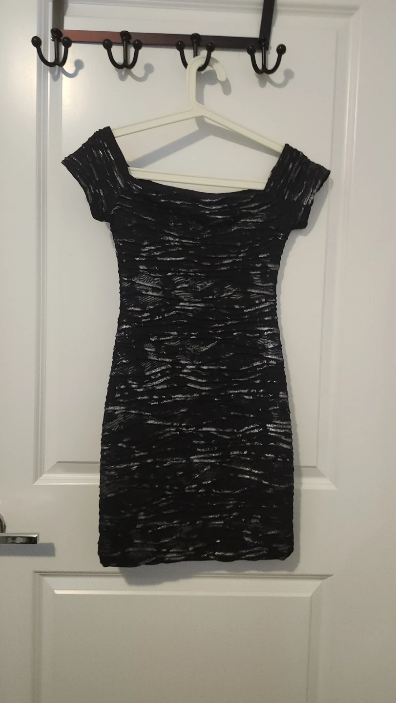 Black off-the-shoulder textured dress
