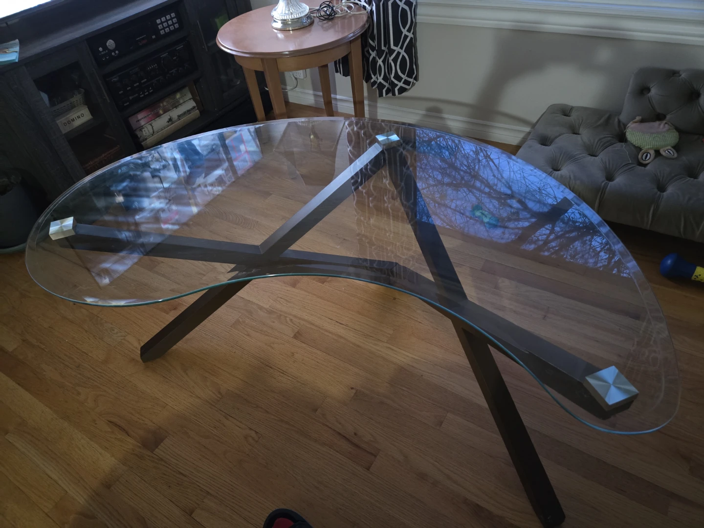 Curved Glass Coffee Table with Dark Wood Legs