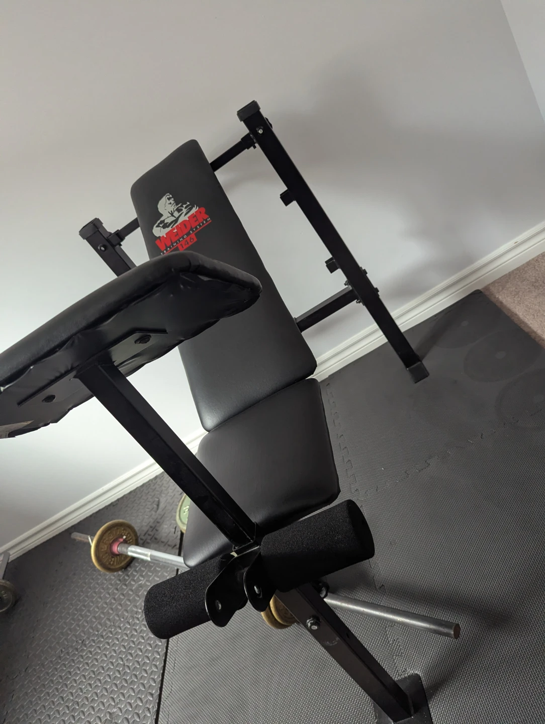 Exercise bench + straight bar + weights - photo 2