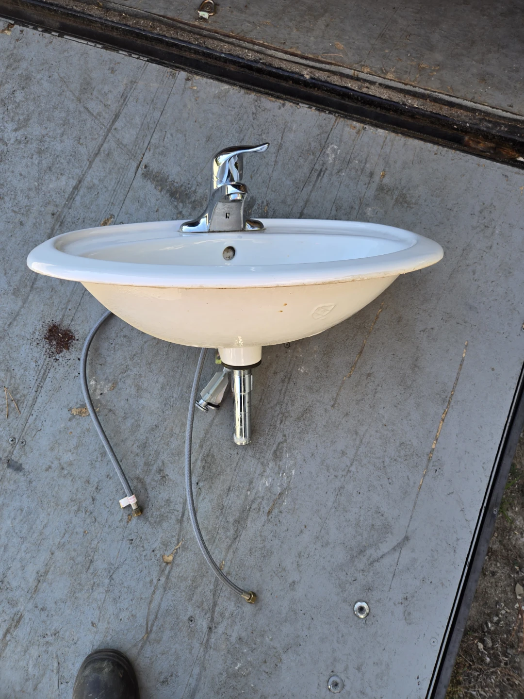 White Oval Sink with Faucet