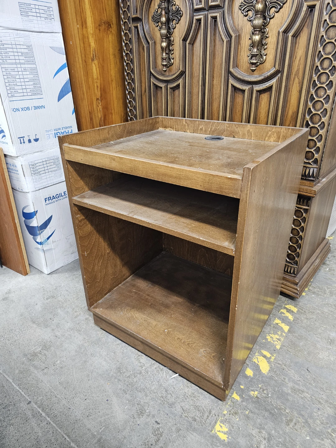Wooden TV table on wheels
