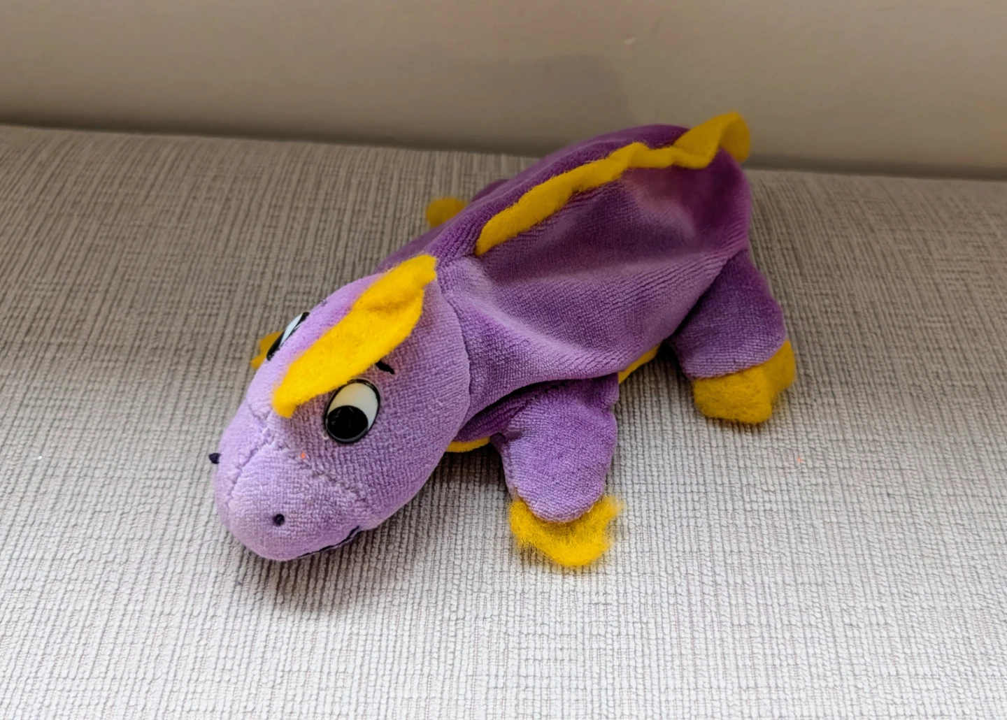 Purple and Yellow Plush Dinosaur Toy
