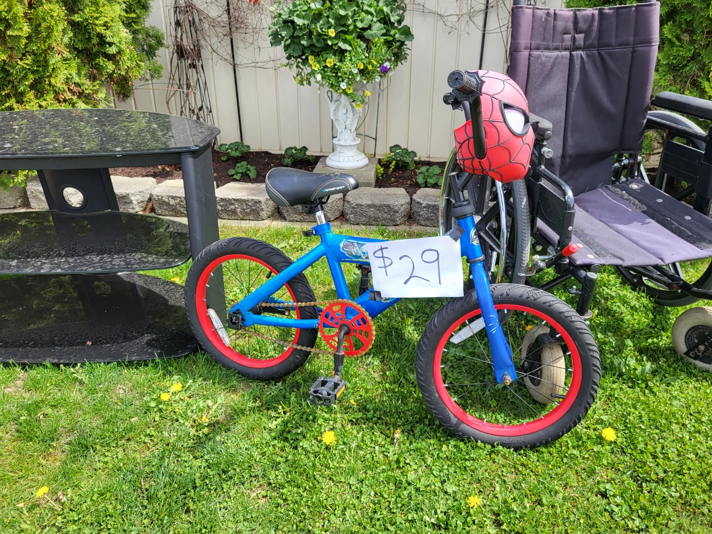 Blue BMX Bike with Spider-Man Mask Handlebar Cover