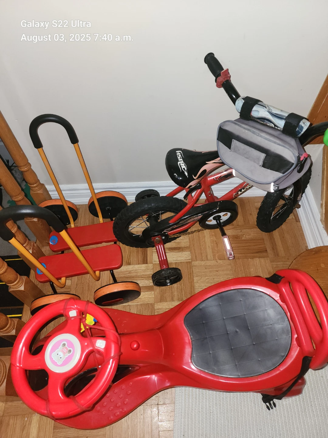 Red Kids Ride-On Toy and Red Bicycle