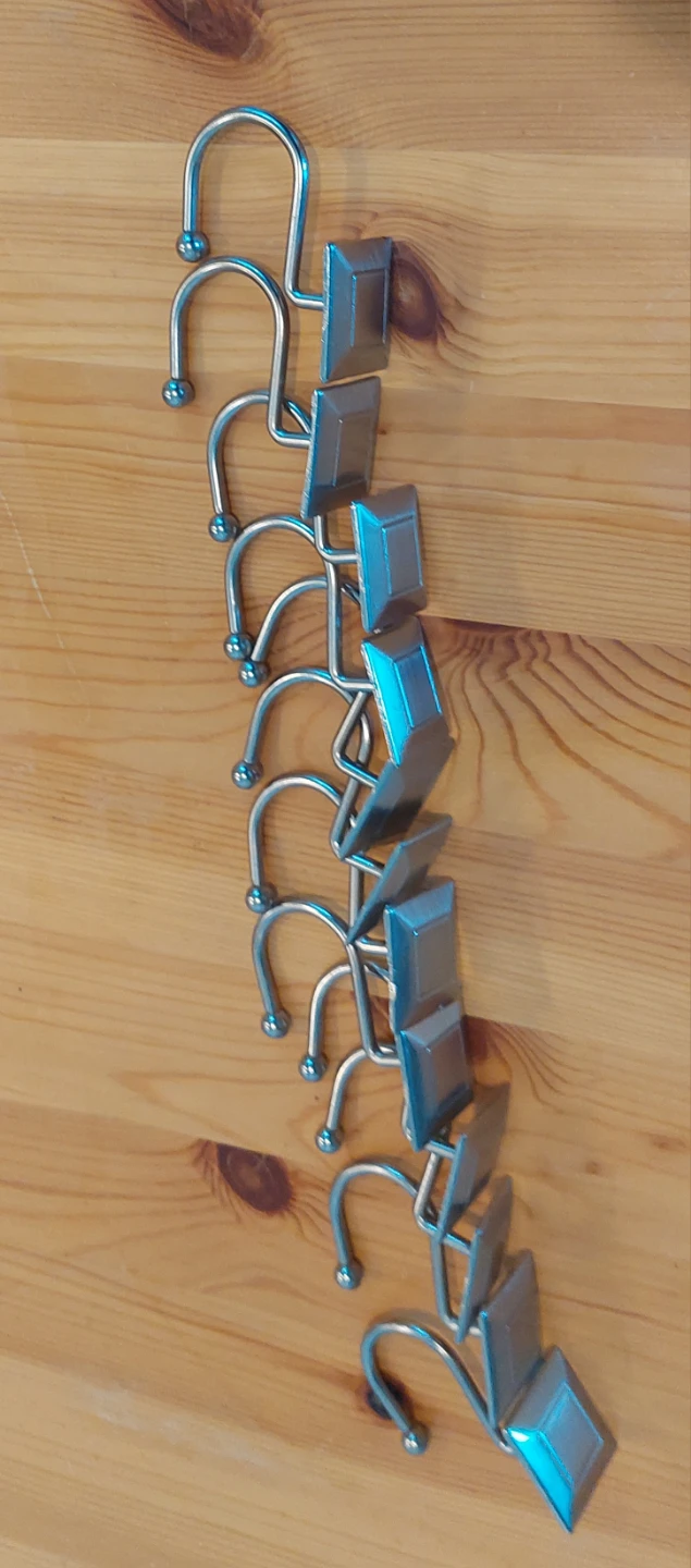 Polished Stainless Steel set of 12 curtain hooks. - photo 3