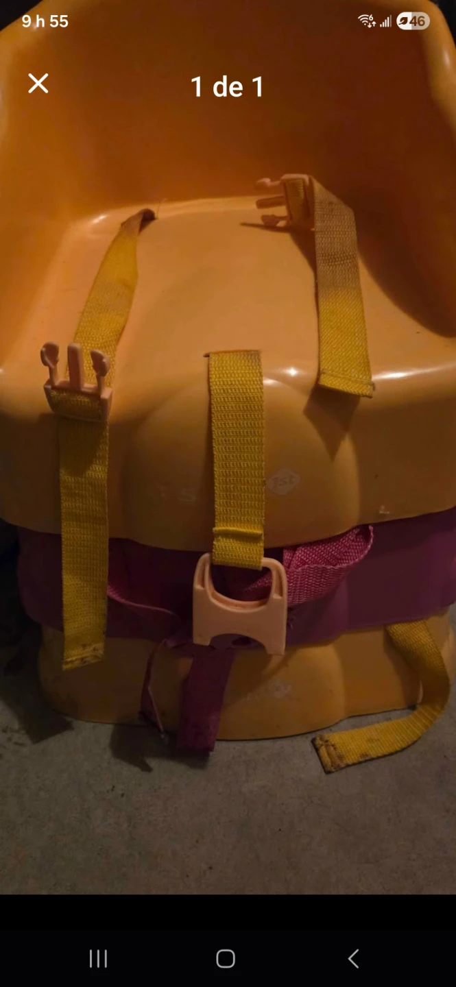 Yellow booster seat with harness
