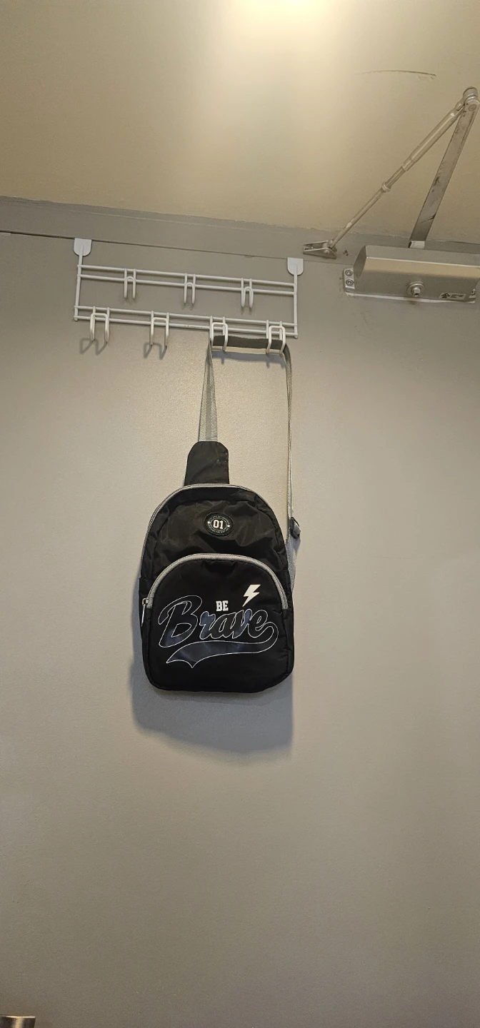 Black Sling Bag with "BE BRAVE" Graphic