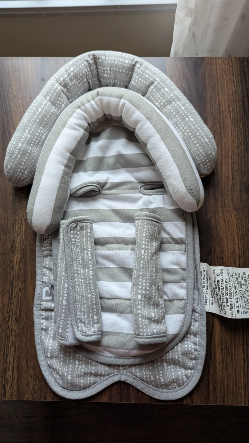 Munchkin head support and strap cover