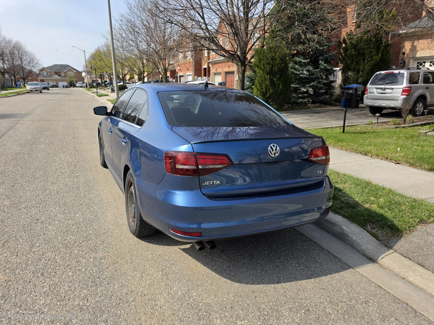 Blue Volkswagen Jetta TSi Sedan - photo 3