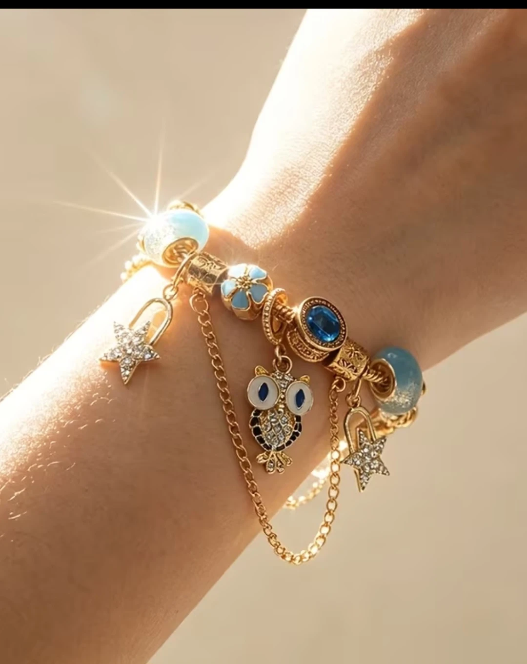 Gold Tone Charm Bracelet with Owl and Star Charms