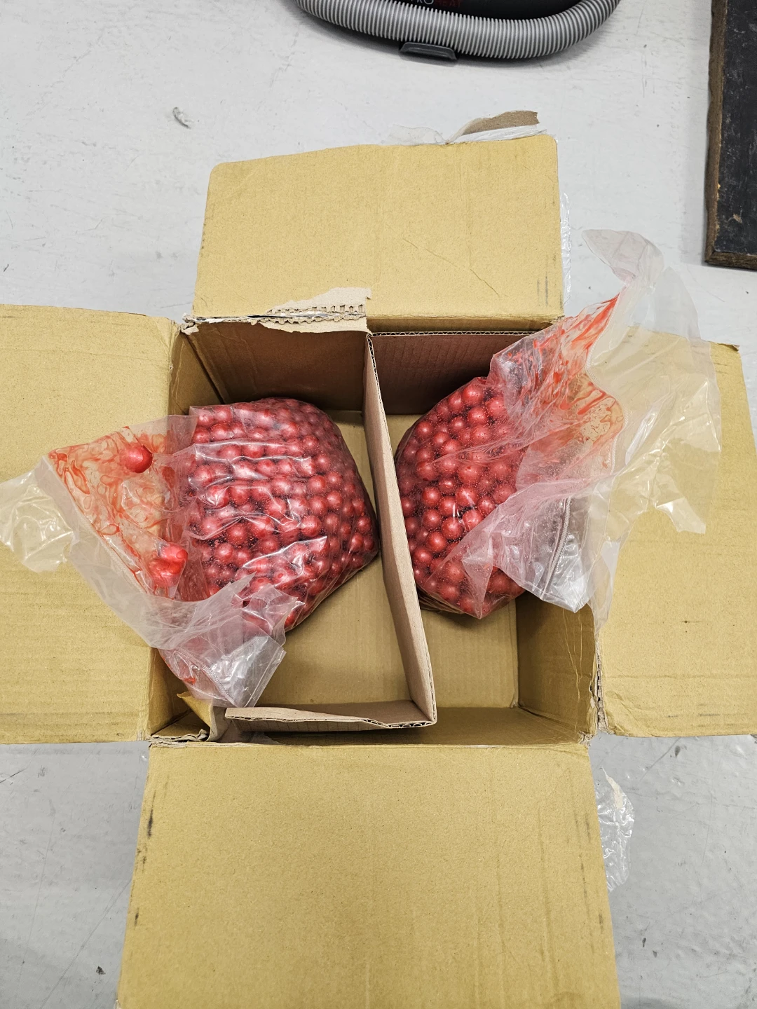Two Bags of Red paintball Pellets