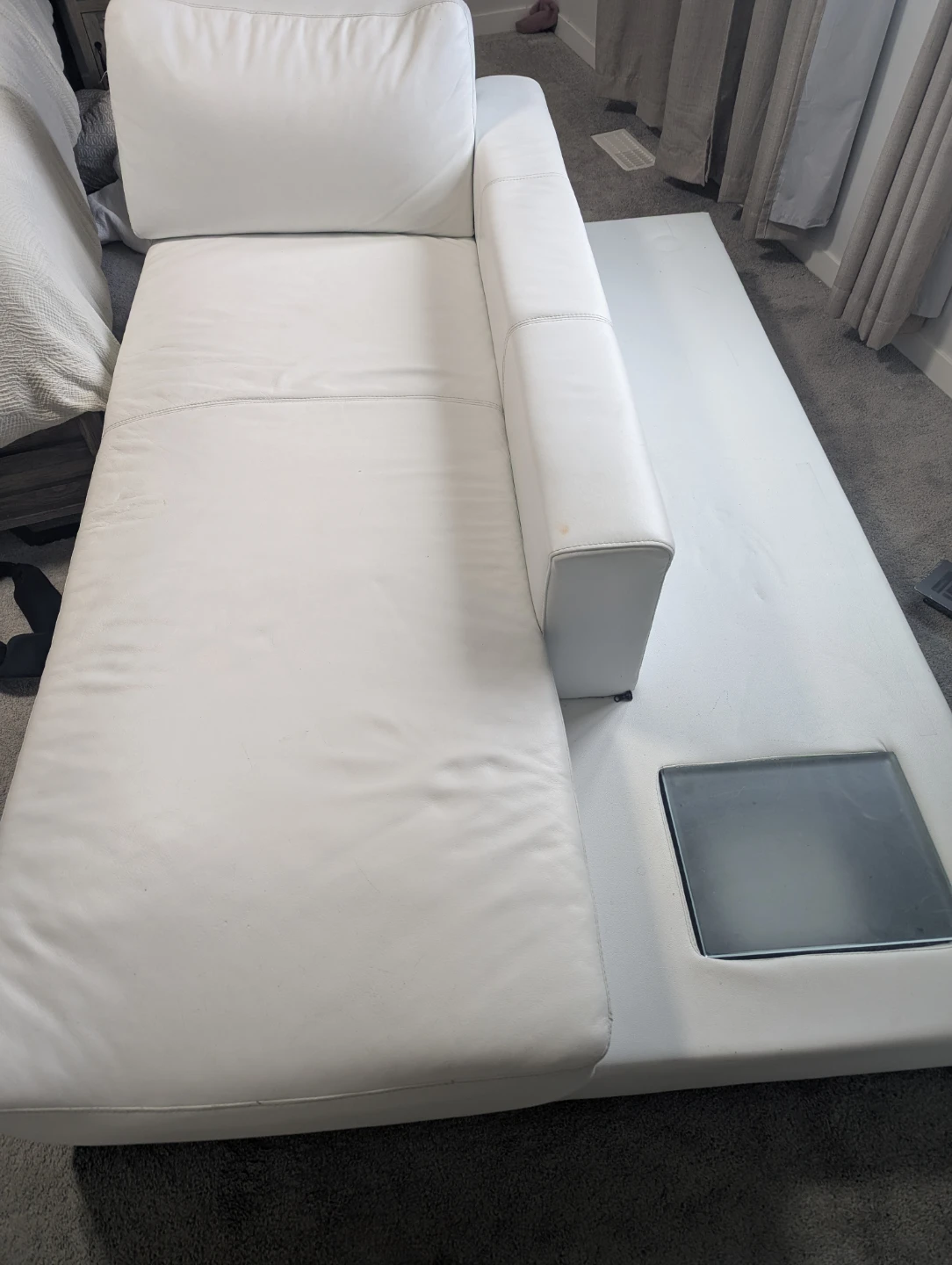 White Leather Chaise Lounge with built-in side table
