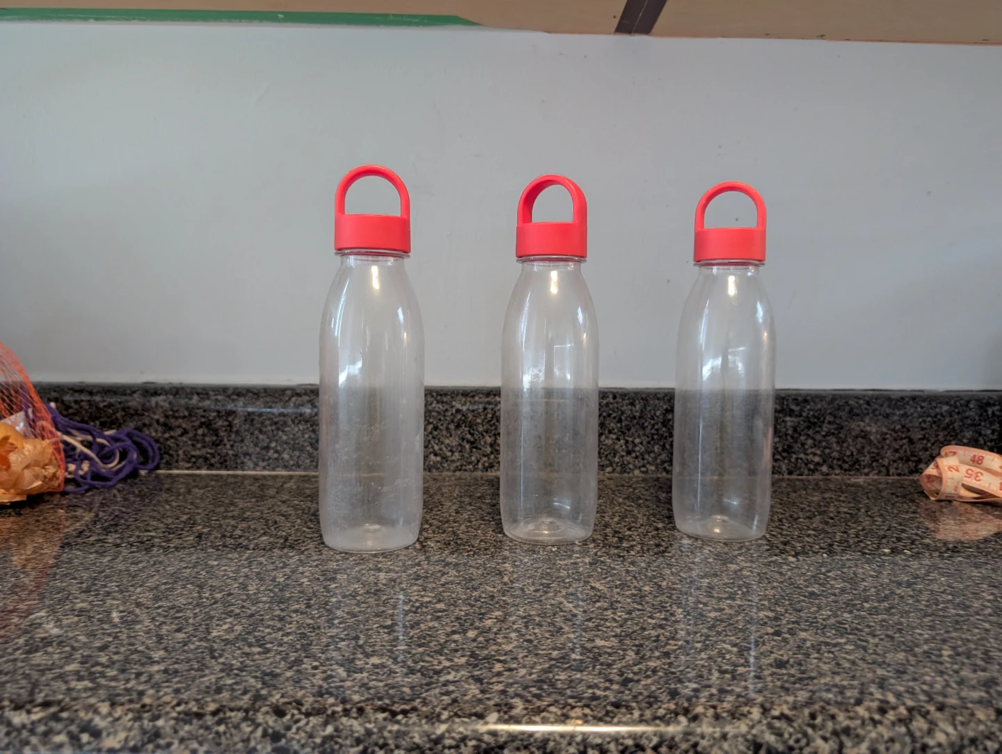 Set of 3 Clear Plastic Water Bottles with Red Lids
