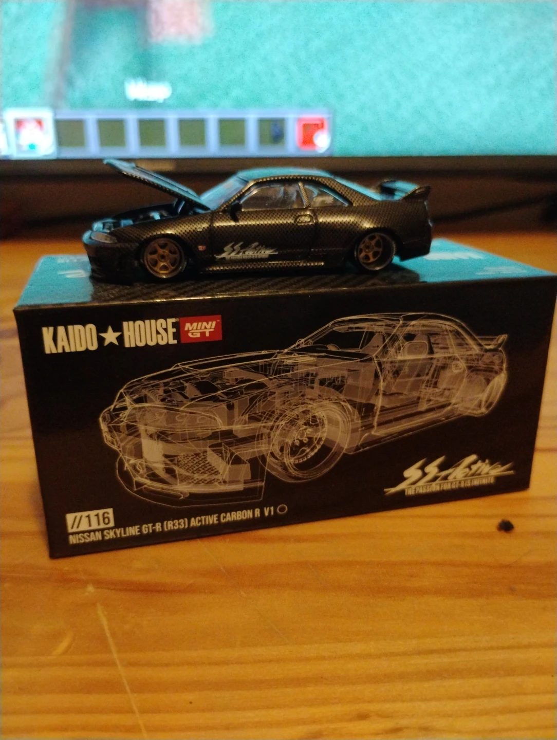 Kaido House Mini GT 1/116 Nissan  GT-R (R33) Active Carbon