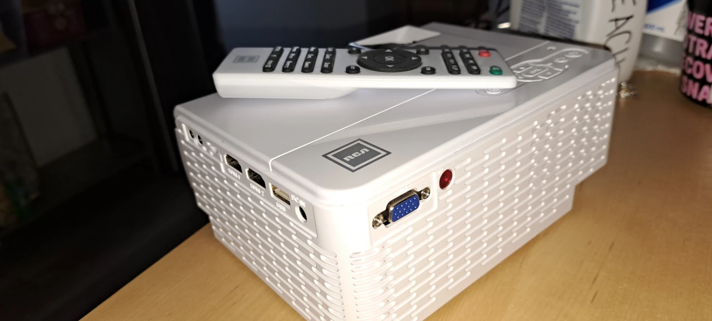 RCA Projector Kit with Screen & Built-In Sound! - photo 2