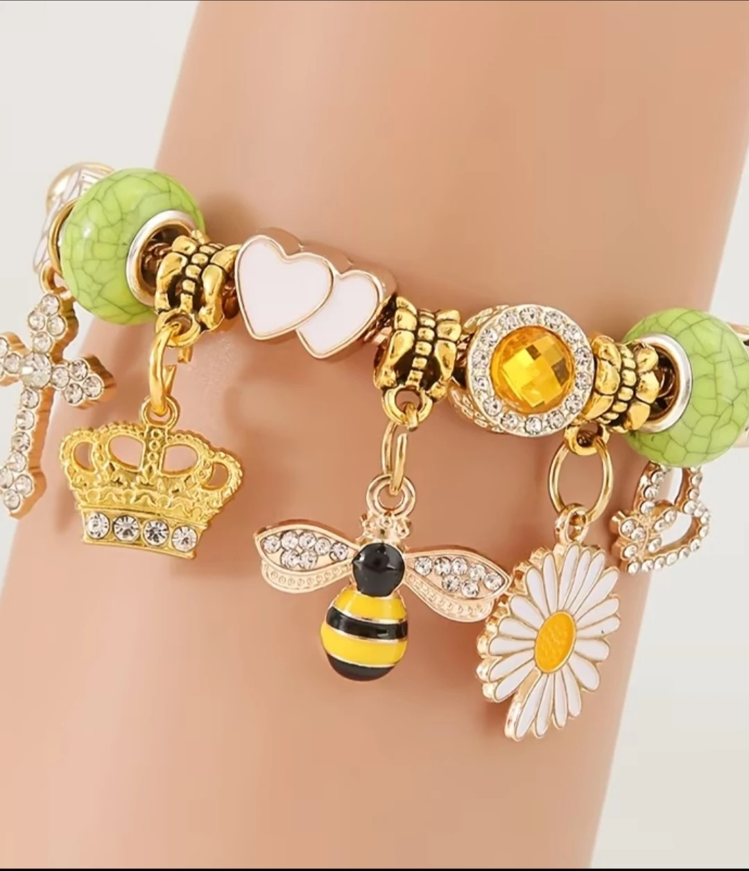 Charm Bracelet with Bee, Crown, and Daisy Charms
