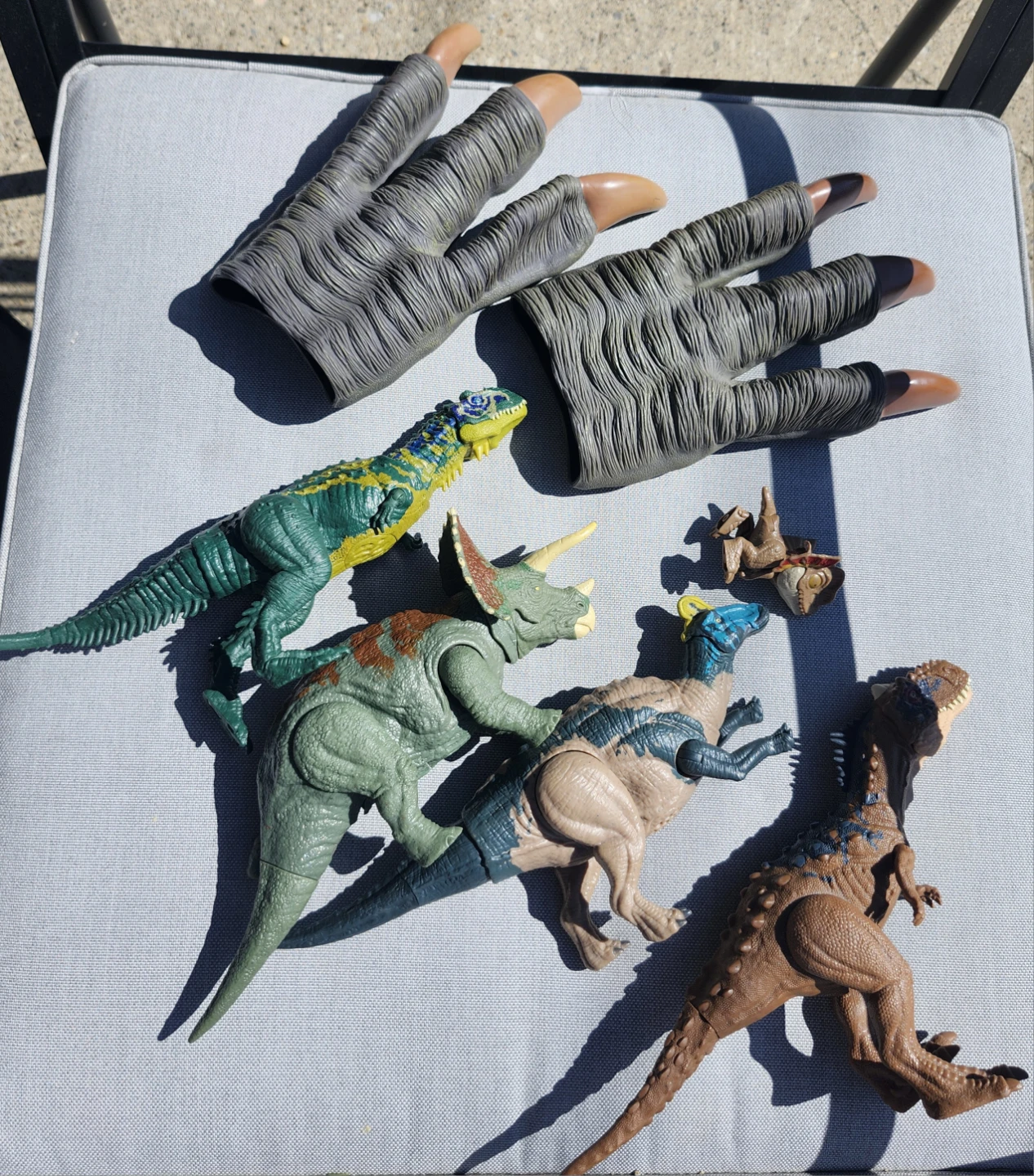 Dinosaur Toy Figures and Dinosaur Hands