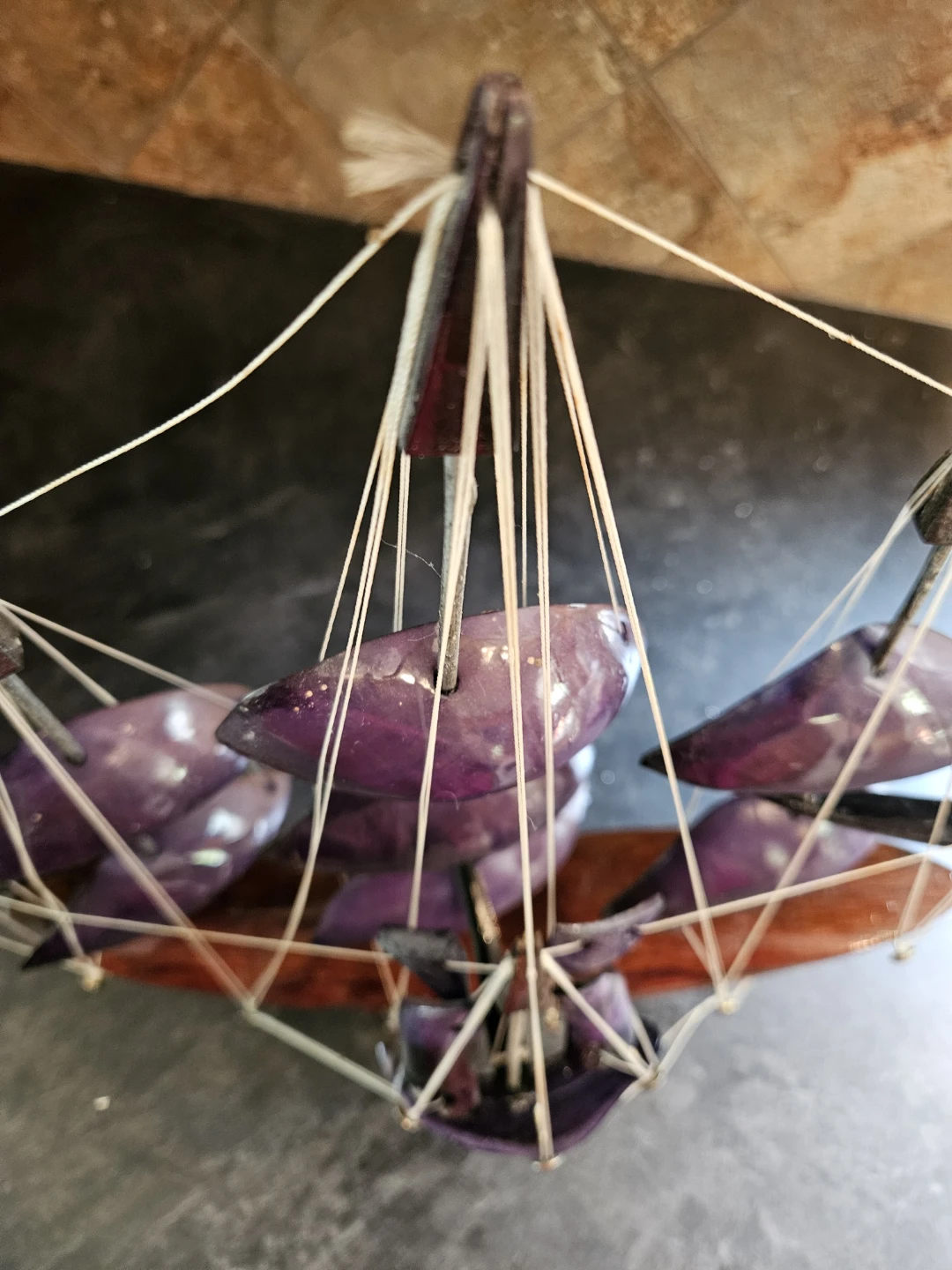 Wooden Sailboat Model with Purple Sails