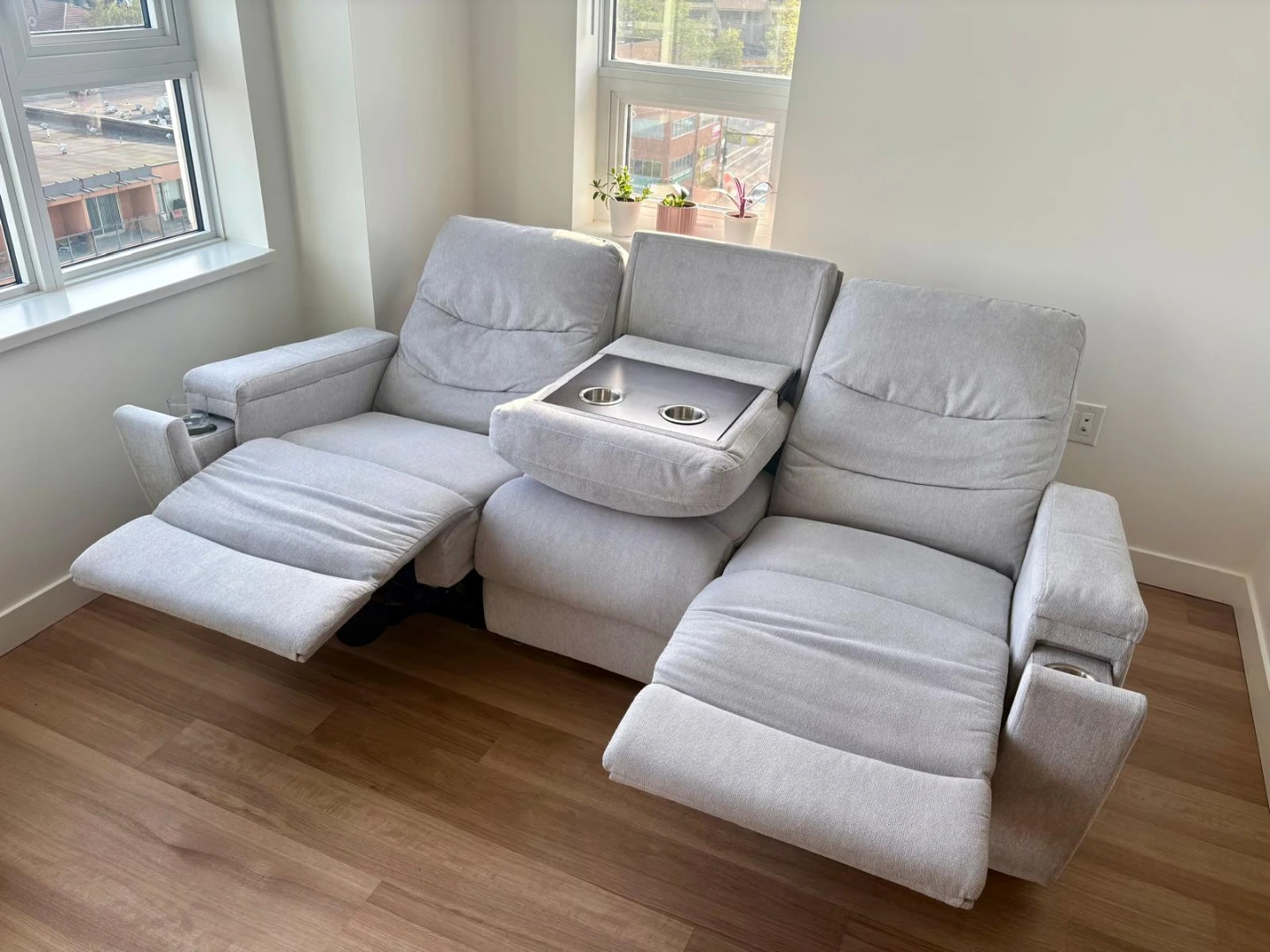 Grey Fabric couch with power Reclining seats