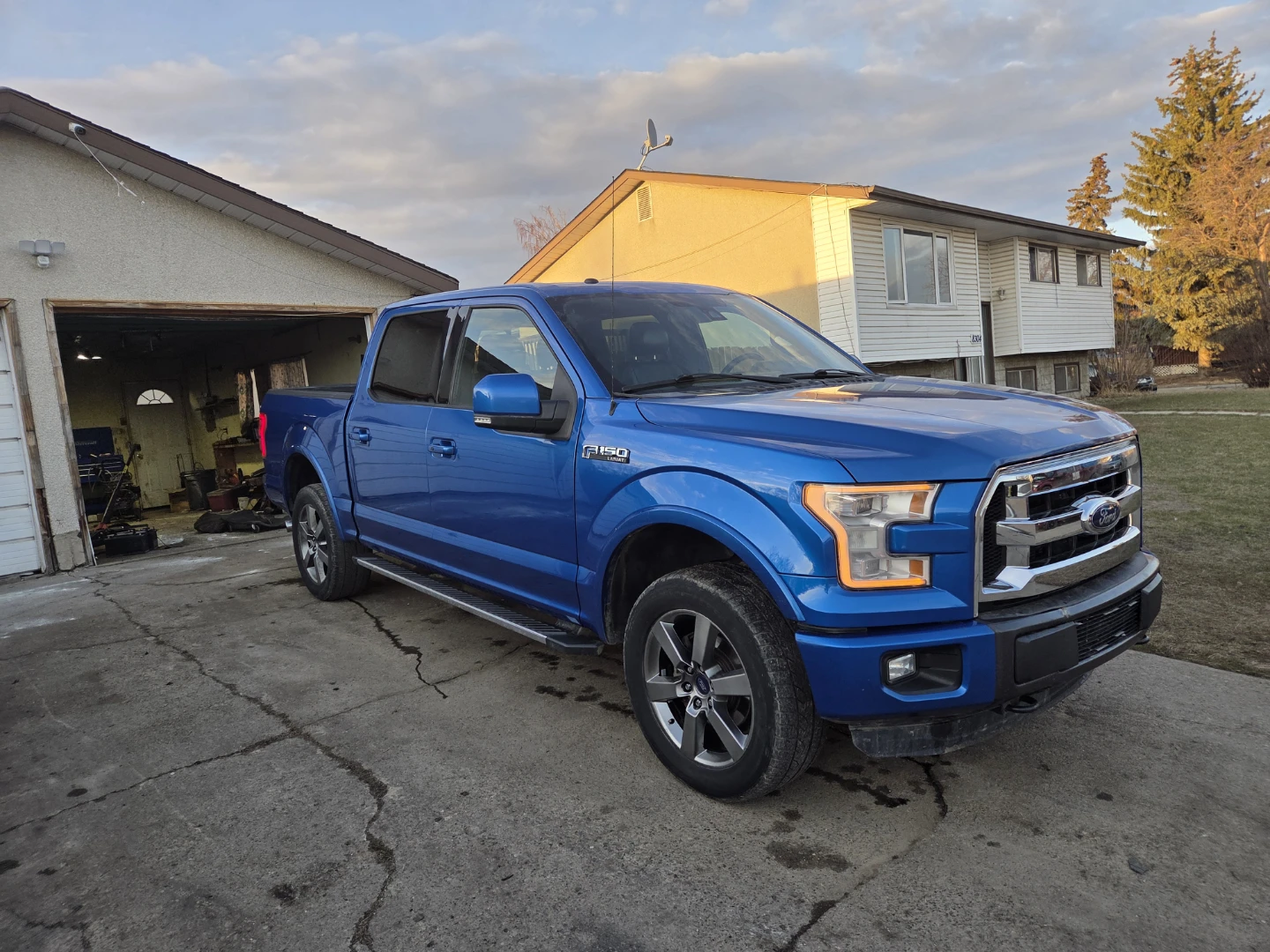 Blue Ford F-150 Lariat Truck