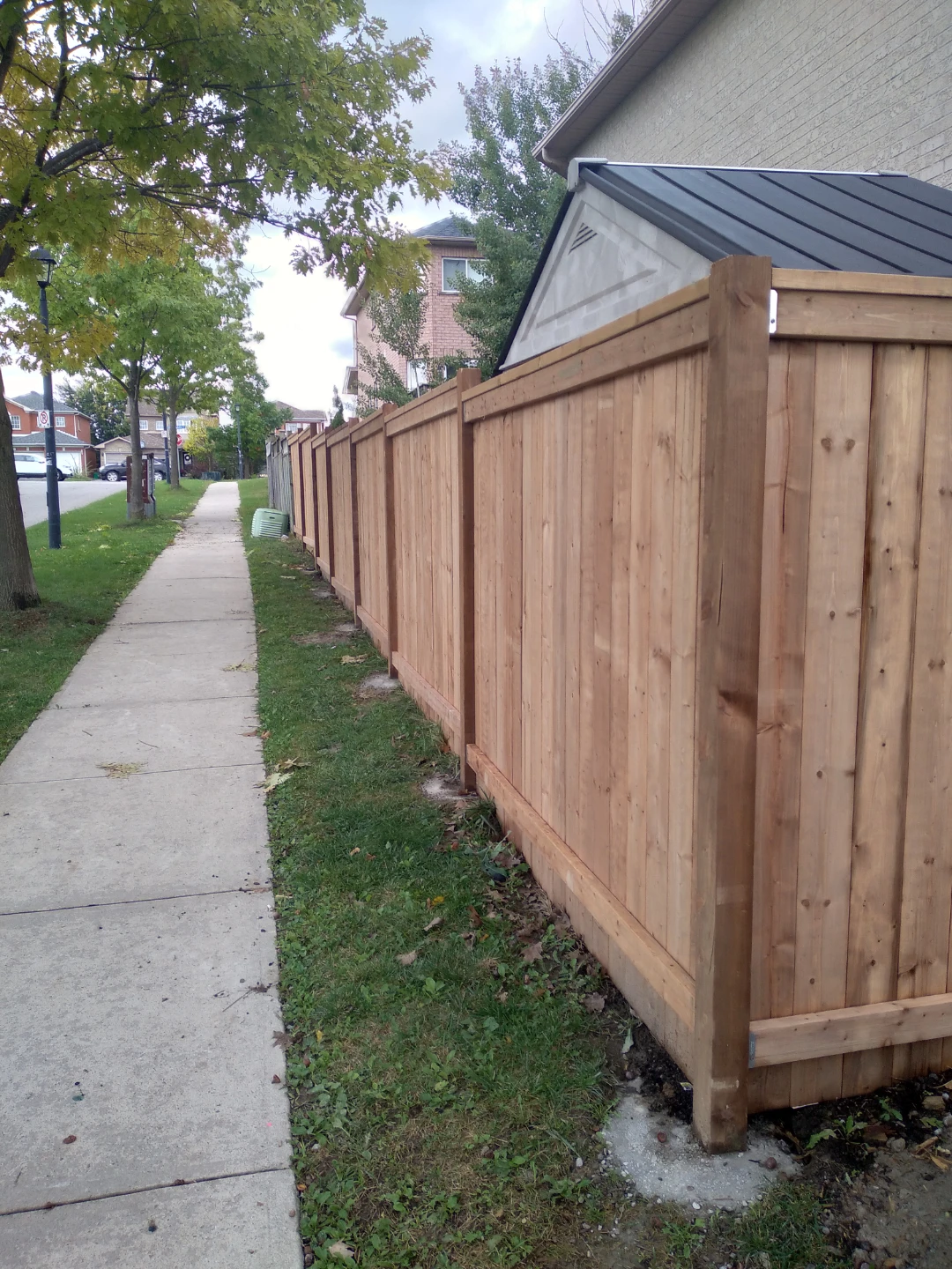 Wooden backyard fence with gate