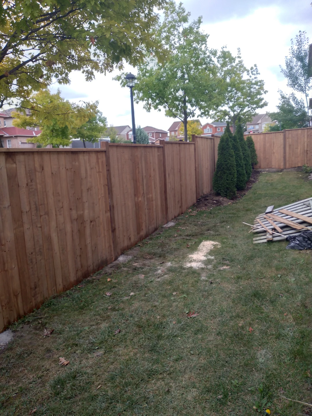 Wooden backyard fence with gate - photo 2
