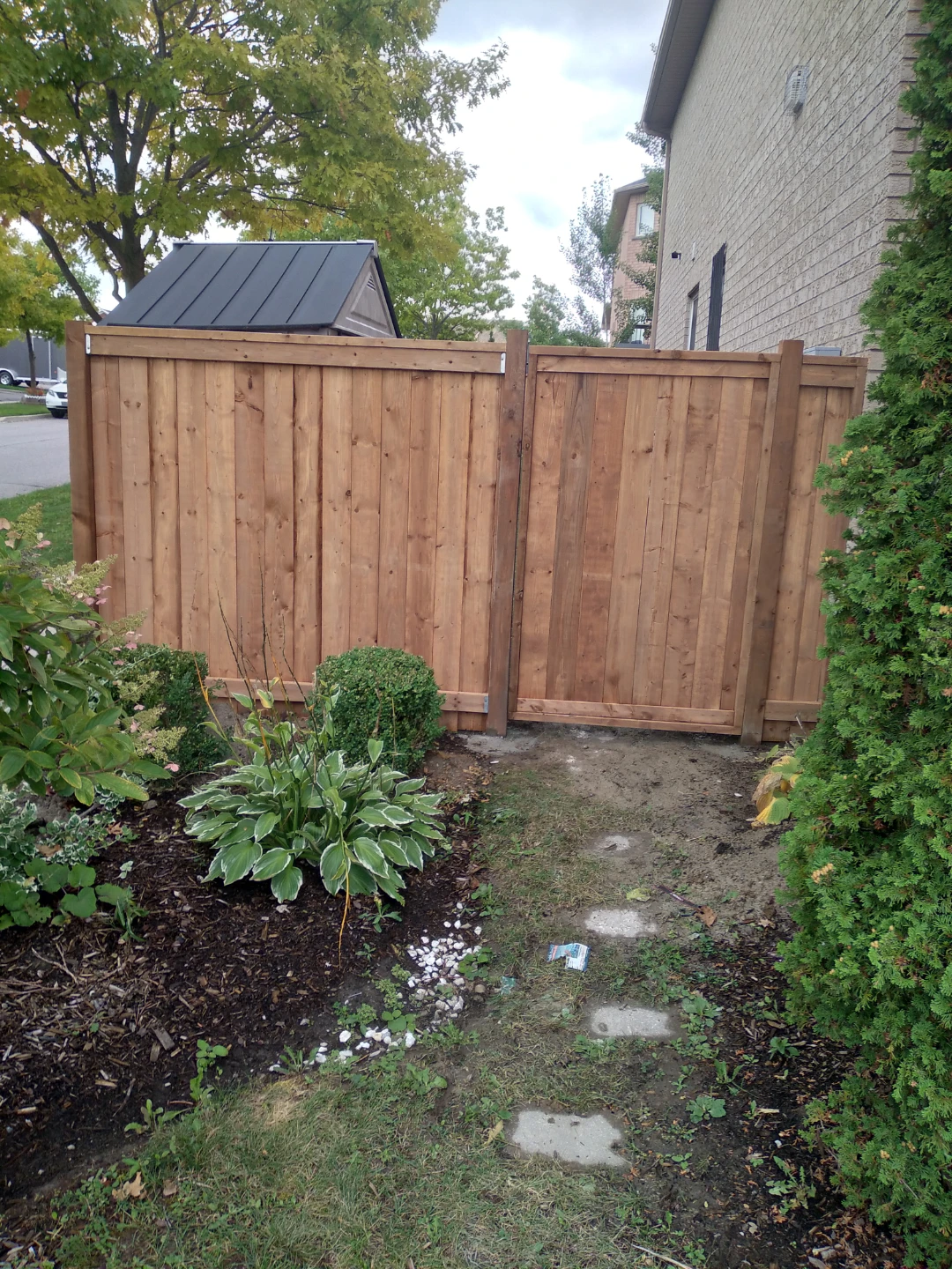 Wooden backyard fence with gate - photo 3