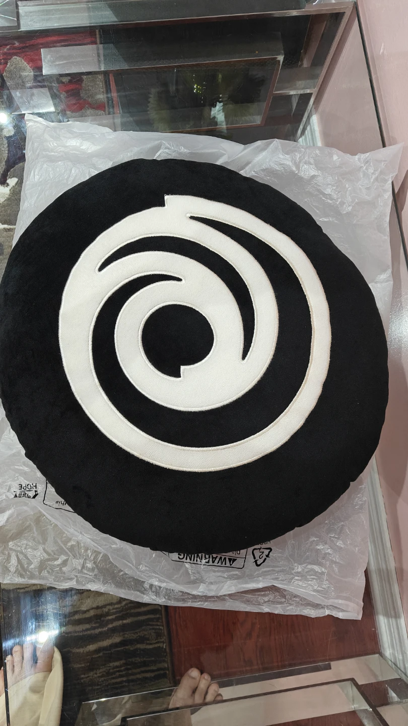 Black Round Cushion with White Swirl Logo