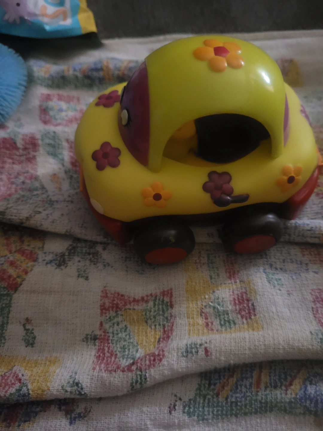 B. toys Wheeee-Ls pull-back flower toy car.