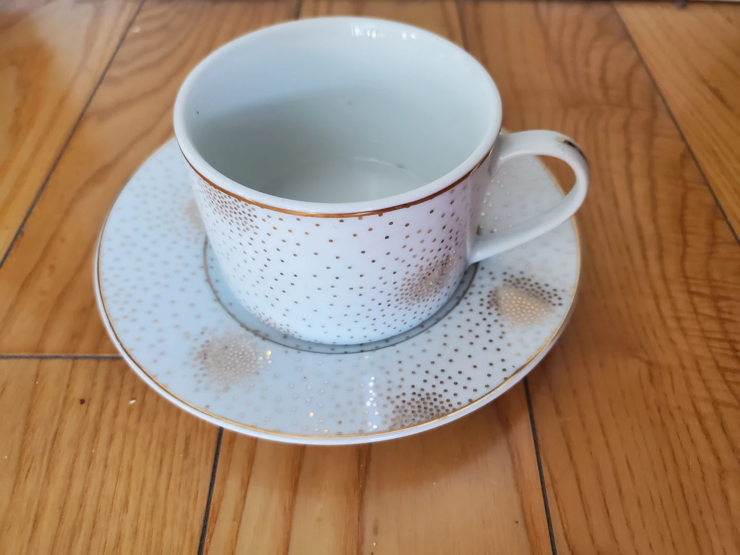Cute gold speckled teacup and saucer