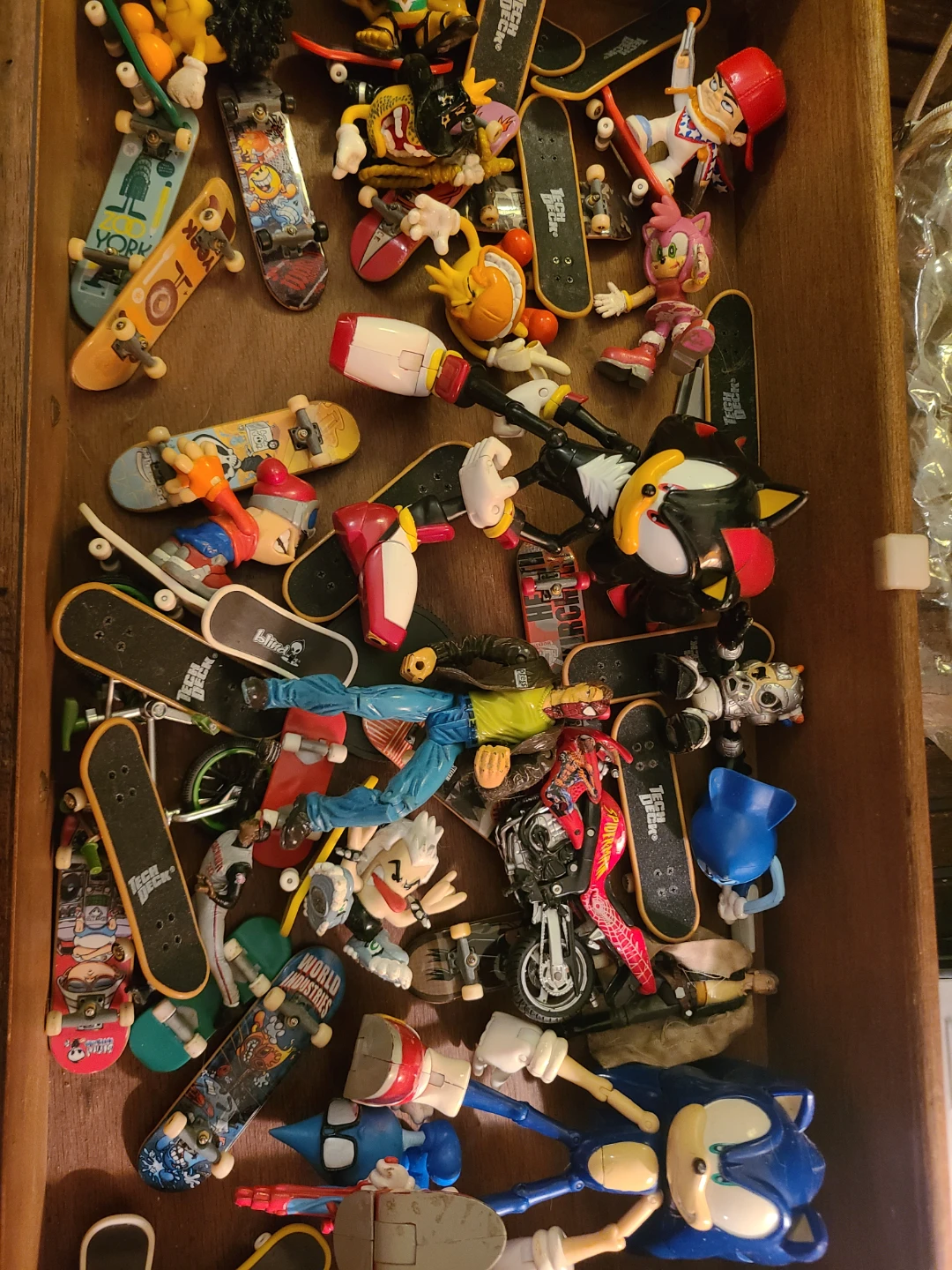 Assorted Tech Deck Fingerboards and Sonic Figures