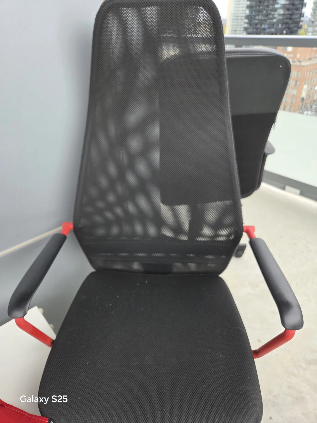 Black Mesh Office Chair with Red Accents