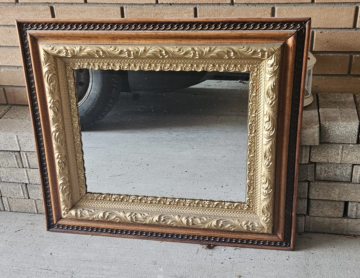 Ornate Gold and Wood Framed Mirror