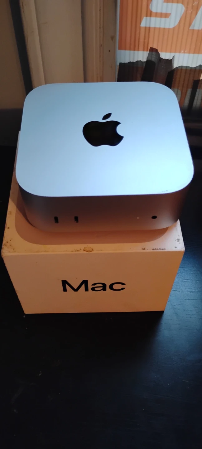 Apple M4 Mac mini with monitor, webcam, keyboard and mouse
