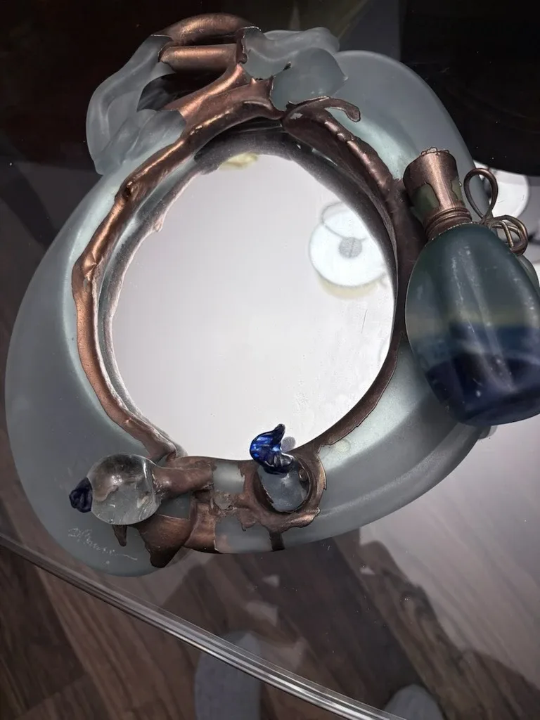 Mirror with perfume bottle / vase